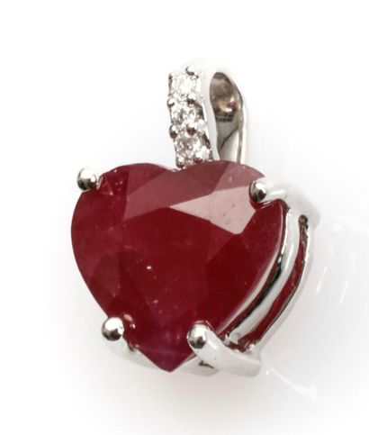 null 18K white gold pendant set with a 3.06-carat heart-cut ruby topped with small...