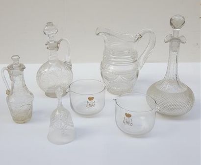 null Set of CRYSTALS: one pitcher, two carafes, one table bell, two small gold-coded...