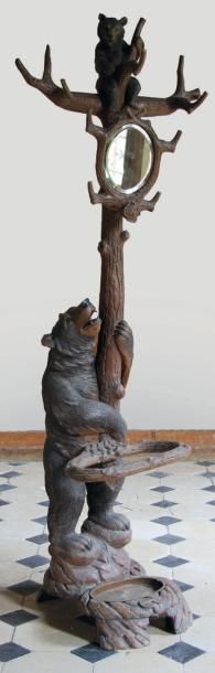 null PORTE-MANTEAU formant aussi porte-parapluie en bois naturel sculpté d'une ourse...
