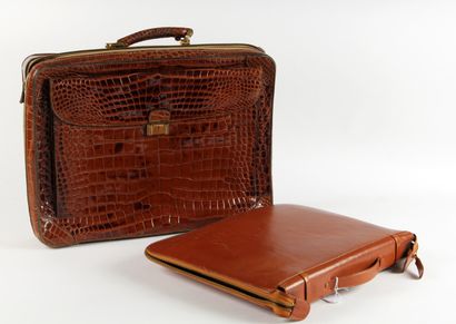 null Small brown crocodile suitcase, the main pocket with a zipped pocket inside...