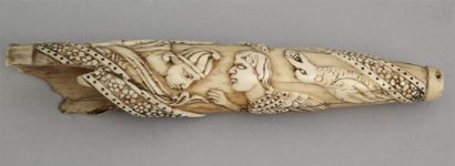 null ELEMENT of powder flask in ivory carved with winged characters and frieze of...