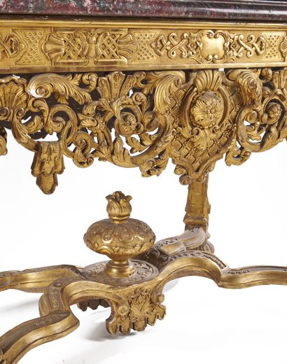 null Important moulded, carved and gilded wood MIDDLE TABLE with four console posts...