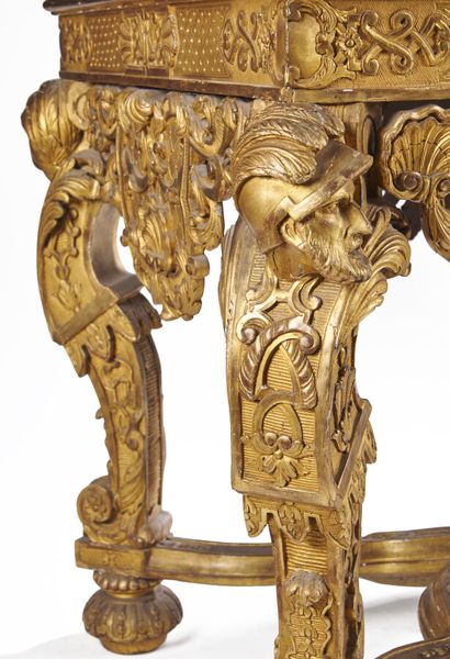 null Important moulded, carved and gilded wood MIDDLE TABLE with four console posts...