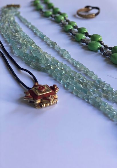 null Fancy Jewelry set consisting of a necklace of polished green stones alternating...