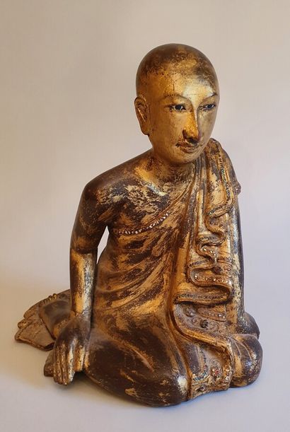 null ADORANT en bois sculpté doré incrusté de pierres de couleurs en verre

Birmanie,...