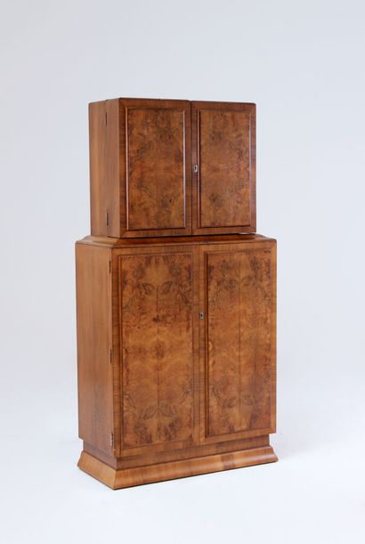 null TWO BODY CABINET FORMING A BAR in walnut and burr veneer, the upper part opening...