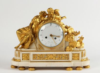 A white marble and gilt bronze hanged clock,...