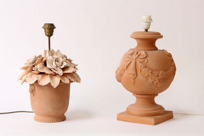 null Two LAMP FEET in terracotta, one decorated with a garland with a ribbon knot,...