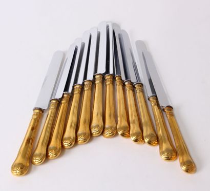null CHRISTOFLE

Twelve gilded metal COUVER and twelve gilded metal knives for entremets,...