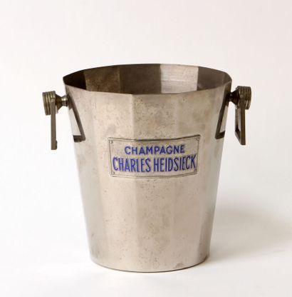 null A faceted silver-plated Art Deco style champagne bucket signed Charles Heidsieck...
