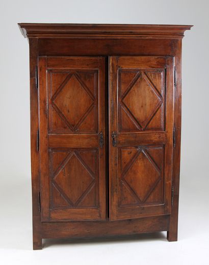 ** Natural wood molded cupboard opening with...