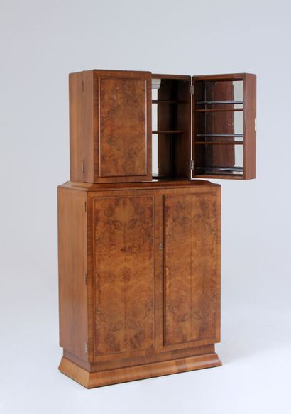 null TWO BODY CABINET FORMING A BAR in walnut and burr veneer, the upper part opening...