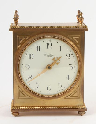 Rectangular table clock in gilded metal decorated...