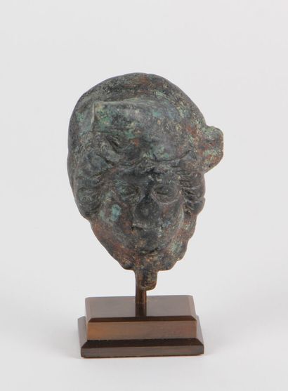 null HEAD OF THE GOD ATTIS wearing the Phrygian cap. Bronze
Roman period
Height 8...