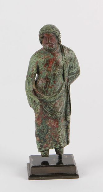 null JUPITER represented standing, a cloak draped over his left shoulder and wrapped...
