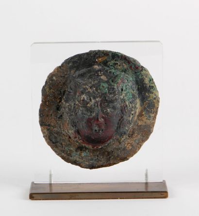 null ORNATED PHALA in relief of a Medusa protome. 
Bronze
Roman period
Diameter 9...