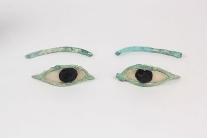 null Pair of EYES and EYES of sarcophagus.
Bronze and alabaster
Egypt
Saite period
Length....