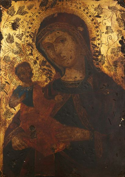 null ICÔNE à fond or représentant la Vierge à l'Enfant. Panneau cintré.

XIXe siècle,...
