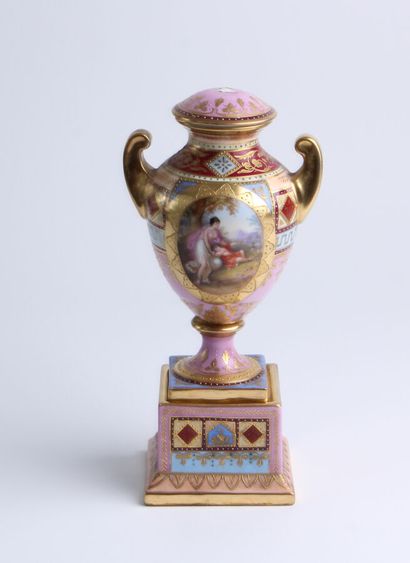 null Porcelain baluster vase on pedestal with polychrome decoration of mythological...