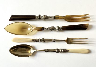 null Two silver or silver-filled salad servers, one with ivory handle, the other...