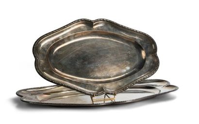 null Two oval silver dishes with contoured edges with laurel frieze and palmette...