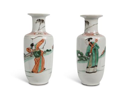 null Pair of small porcelain spindle-shaped VASES and enamels of the green family...