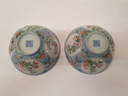 null 
Pair of porcelain and polychrome enamelled CUPS on heel decorated with flowering...