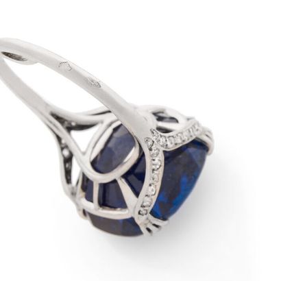 CHAUMET Platinum (850 thousandths) ring set with a cushion-shaped sapphire weighing...