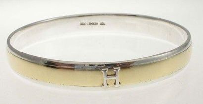 HERMES Bracelet jonc en argent et or 18K, Monogramme - Largeur: 0,8 cm - Taille 18...