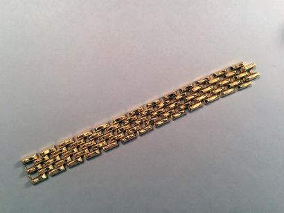 null Bracelet en or 18K (750 °/°°) à mailles lingot articulées
Poids: 53,1 g - Long.:...