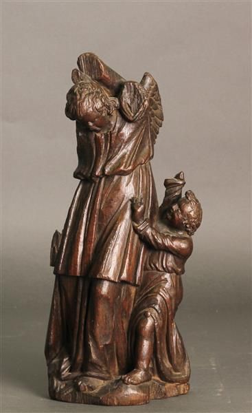 null STATUETTE en chêne sculpté d'ange et d'un putto. 
Fin du XVIIe siècle
Manques
Haut....