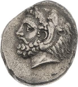 null ÎLES de CARIE 
Cos (366-300 av. J.-C.) 
Tétradrachme. 14,52 g. Tête barbue d'Héraclès...