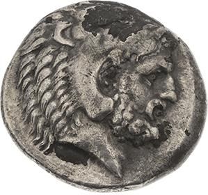 null ÎLES de CARIE 
Cos (366-300 av. J.-C.) 
Tétradrachme. 14,30 g. Tête barbue d'Héraclès...