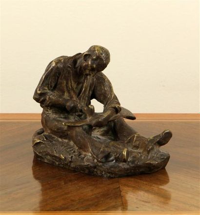 null D'APRÈS AIMÉ-JULES DALOU (1838-1902)
L'aiguiseur de faux
Bronze à patine mordorée,...