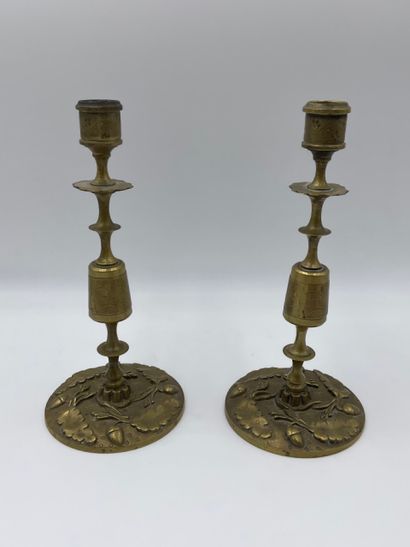 Pair of bronze CANDLES decorated with hazel...