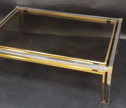 null Roméo REGA (1904-1968), Table basse structure inox et laiton, plateau en verre...