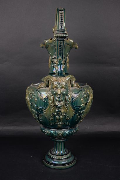 null Important decorative ewer in glazed ceramic, the handle ending with a head of...