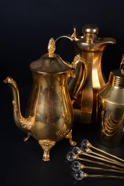 null Gold plated metal service composed of a teapot, a coffee pot, a sugar bowl,...