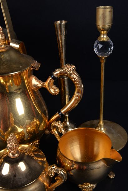 null Gold plated metal service composed of a teapot, a coffee pot, a sugar bowl,...