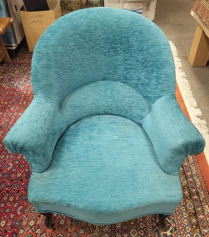 null Toad armchair in black wood upholstered in turquoise-blue fabric.