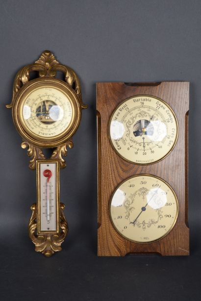 null Set of 2 barometers, one carved and gilded, H. 40 cm