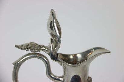 null Cut crystal ewer with silver plated metal frame decorated with vine leaves and...