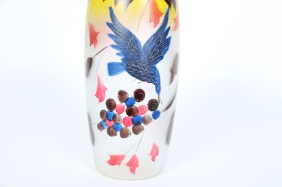 null Large polychrome enamelled vase decorated with bird and grapes on orange background....