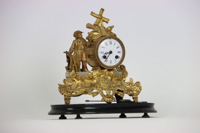 null Chased and gilt bronze clock with a farmer decoration and two brass and silvered...