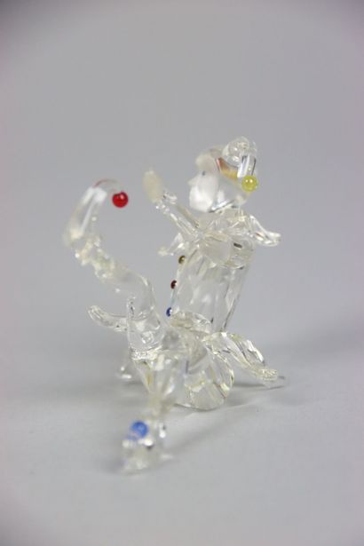 null SWAROVSKY. Crystal subject representing a harlequin. Height: 10 cm