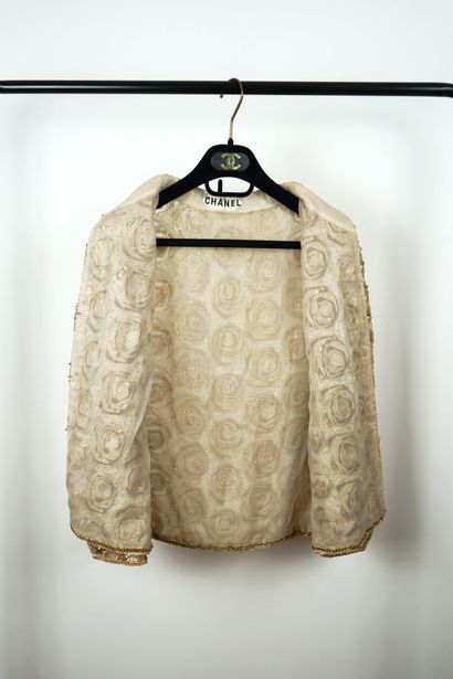 CHANEL Haute Couture X LESAGE Veste, circa 1970

Tulle brodé de sequins blanc et...