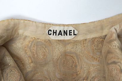 CHANEL Haute Couture X LESAGE Veste, circa 1970

Tulle brodé de sequins blanc et...