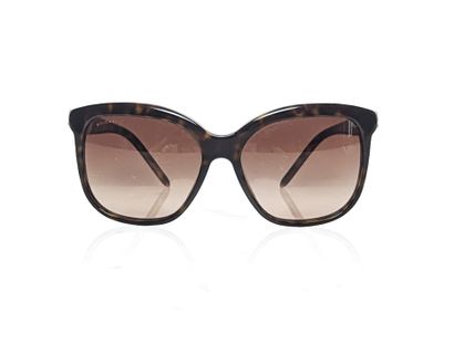 BULGARI Pair of SERPENTI sunglasses
Brown translucent pvc
Width: 14.5 cm
Length:...