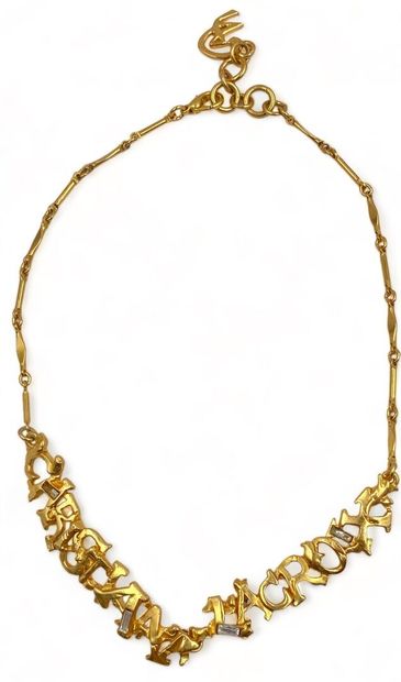 Christian LACROIX Branded choker necklace, circa 1990
Gold-plated metal 
Translucent...