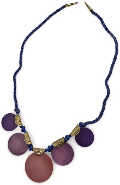 Yves SAINT LAURENT BEAUTE Necklace passementerie
Purple and pink resin beads
Gilded...